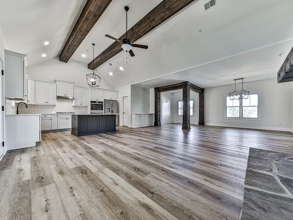The Modern Craftsman &mdash; kitchen and dining with beam ceiling in Ball Ground, GA