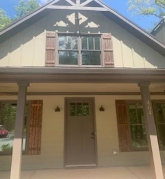 Grace Valley Retreat Center — covered front porch of the completed cabin
