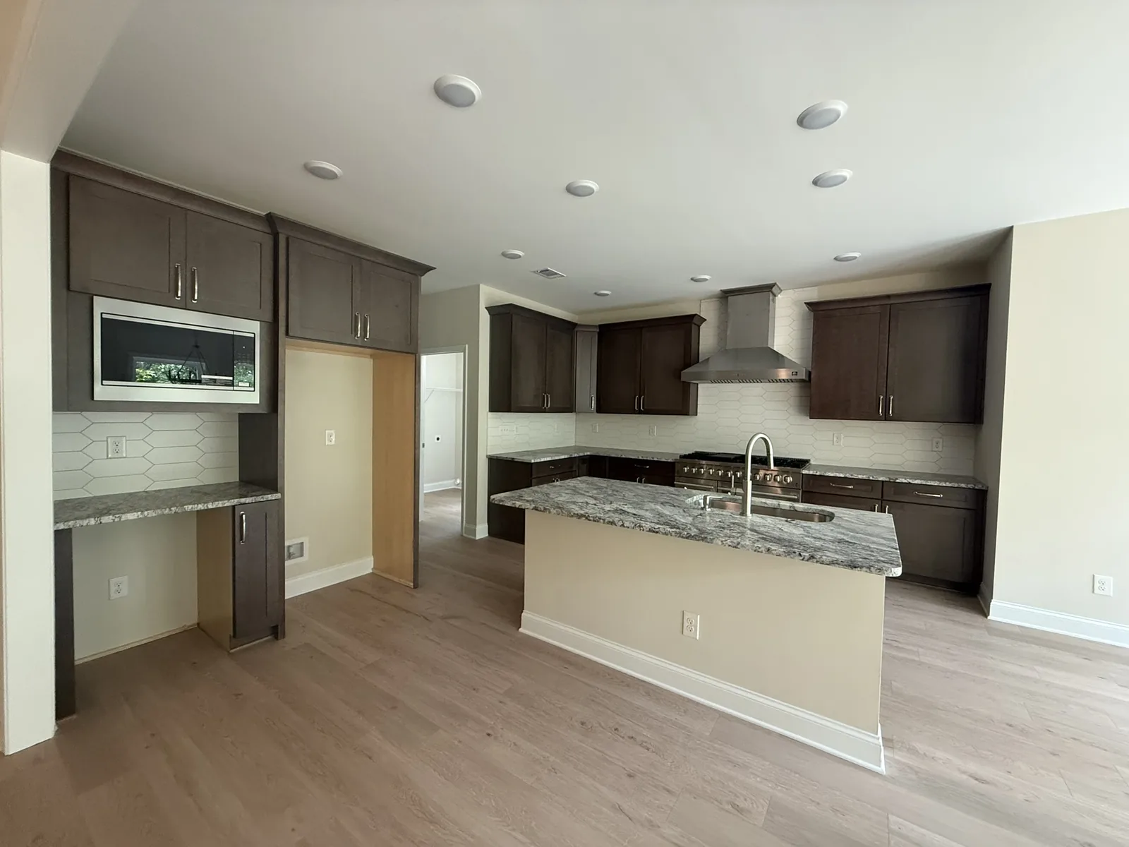 100 Diane Court &mdash; kitchen with island and breakfast bar, Lake Arrowhead, Waleska, GA